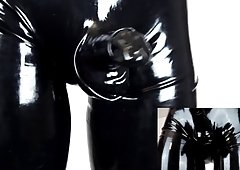 Wearing constricted latex pants and additionally gloves (latex video 2.0)