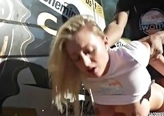 Blonde Takes Deep Throat Anal in Motocross Threesome
