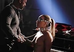 Classy blonde plays submissive for a huge dose of dick